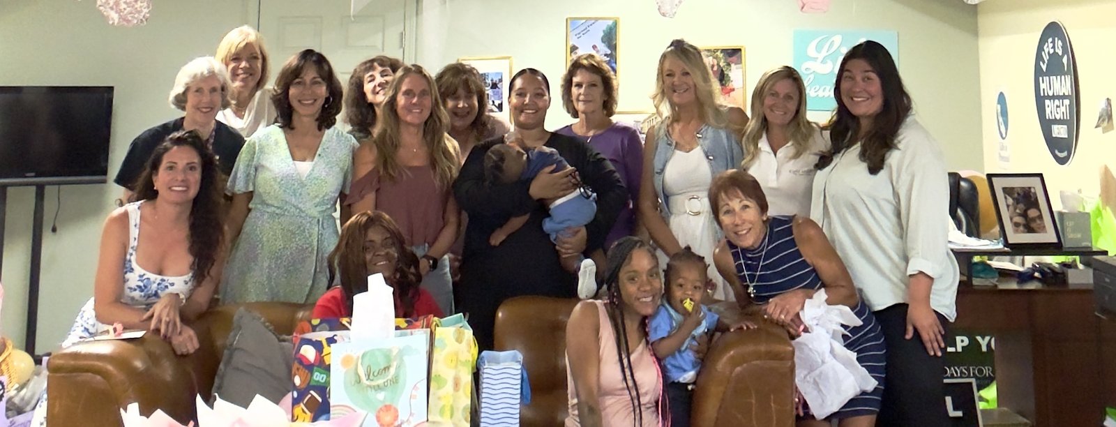 A group of women gathered at a LIFEHOUSE baby shower in fall 2025